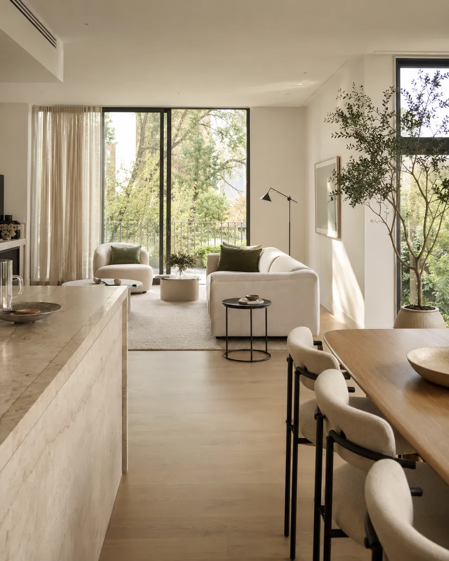 A calm, sunlit living room finished with an immaculate, hotel-level clean